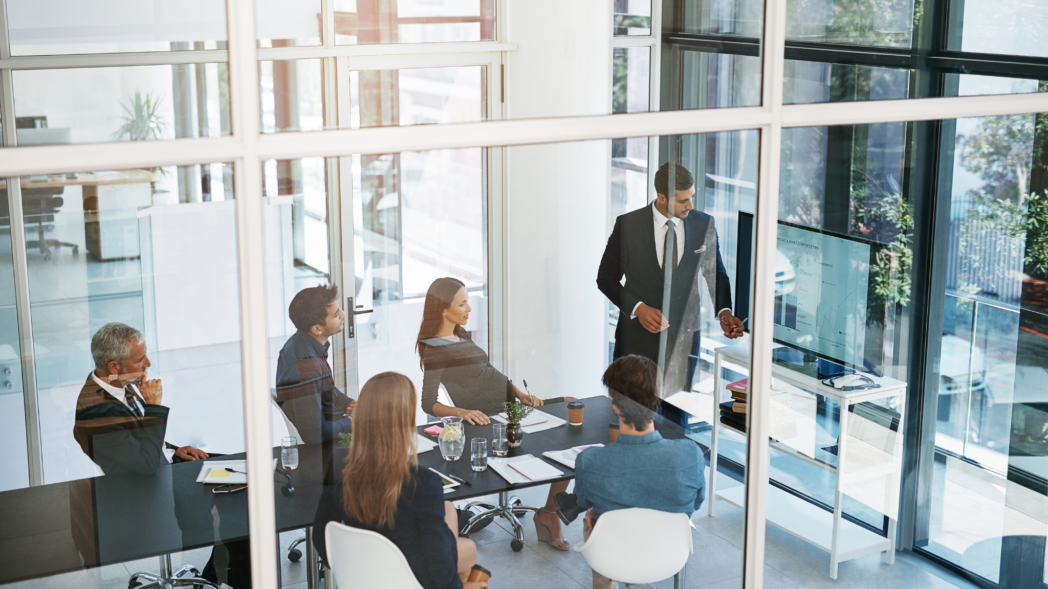 Airline group desk team reviewing requests and documents using GroupRM for intelligent request management